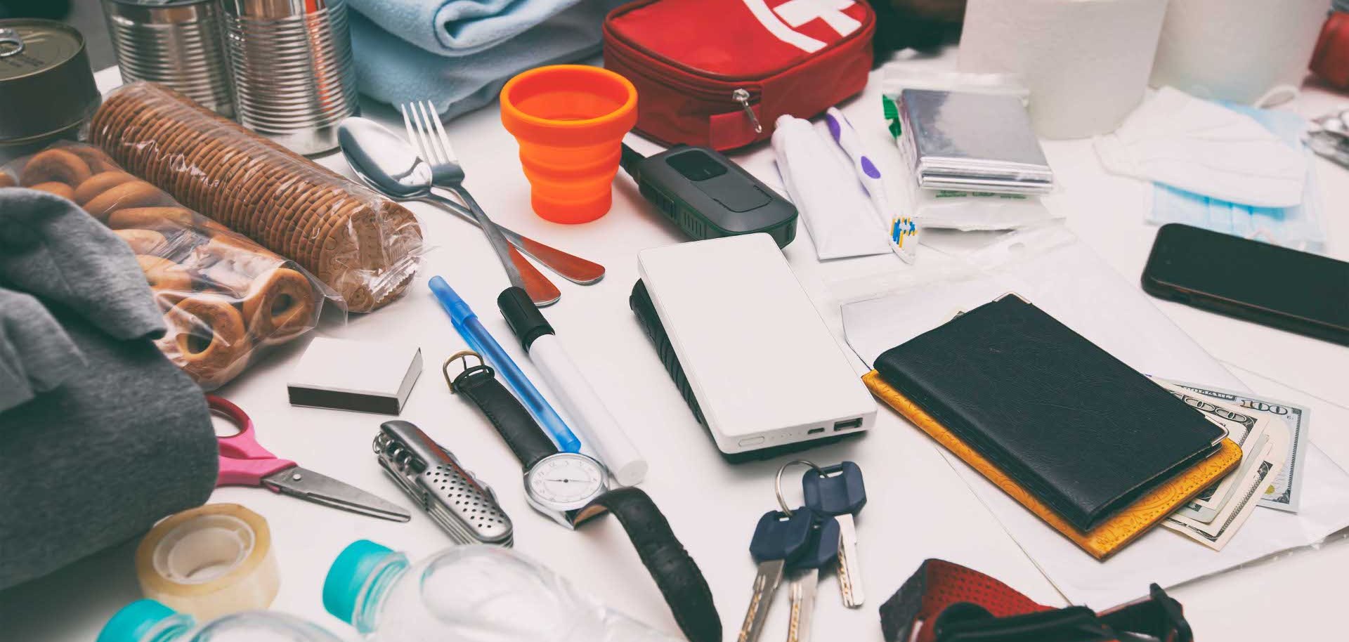 Emergency backpack equipment organized on the table. Documents, Emergency backpack equipment organized on the table. Documents,