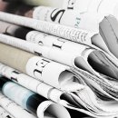 Pile of old newspapers, selective focus